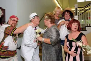 Mystery Dinner Theatre 1 Players from Hat Trick Theatre pause for an impromptu photo. Featured left to right are: Jay Savage Bill Christensen, Jean DeGacomandrea, Sally Wright (back), Richard Scott and Karen Boyle.
