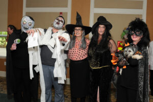Spectacular Spooks at Village at Proprietors Green 1 Village at Proprietors Green staff get into spirit for Halloween. They are left to right: Caitlin Sullivan, business office director; Khaled Amir, memory care resident assistant; Donna King, executive assistant; Kathy Gardner, memory care director; and Colleen Ferguson, executive director, with her dog, Gracie.