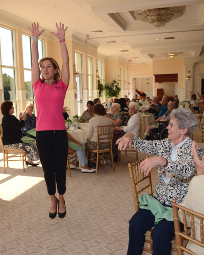 Allerton House Assisted Living Luncheon guest speaker Lauretta Jennings, a certified personal trainer and Chaboom instructor delighted guests with a jump after a spirited demonstration of some of the exercises she teaches the residents.