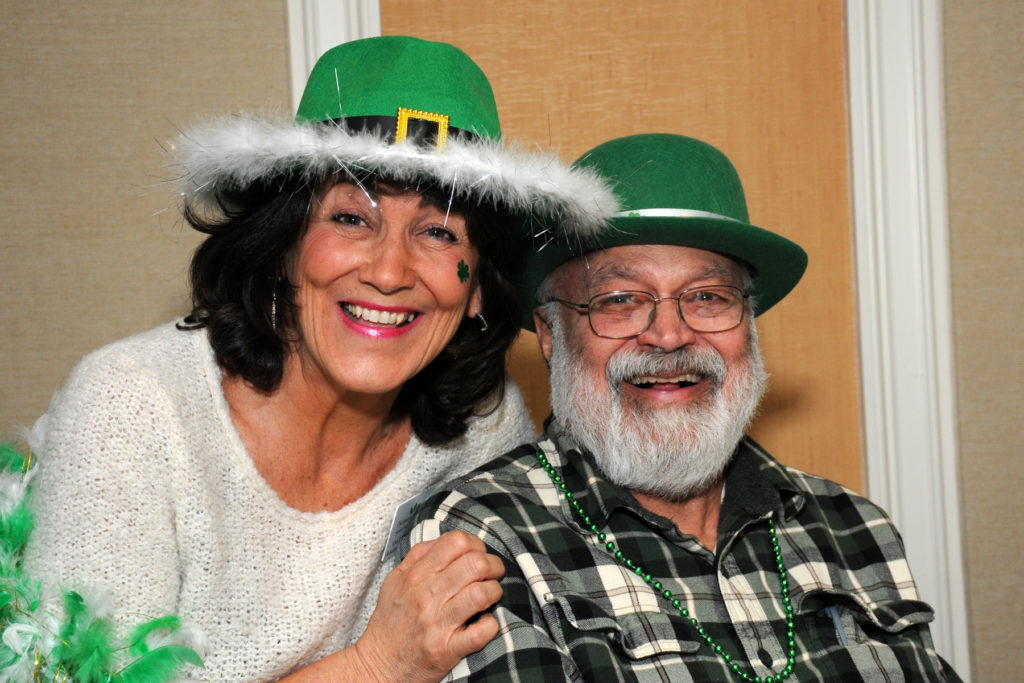 Resident Services Director Valeri Williams and resident Sam Ganguly take no time getting into the spirit of St. Patrick’s Day.