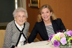 With beautifully set tables and a mouth-watering array of yummy food, resident Lucille Feruzzi and her daughter Laura Haskell are all smiles at the time they get to spend together.