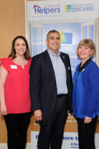 Village at Proprietors Green Sales Director (L) Joann Hicks and Executive Director (R) Colleen Ferguson, pose for a photograph with Mark Friedman, owner of Senior Helpers of Boston and the South Shore, and presenter of the Virtual Dementia Tour program at the senior living community. The Virtual Dementia Tour is designed for a range of healthcare professionals interested in learning more about the ways dementia impacts an aging population.