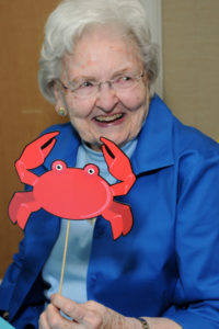 Ocean-themed party decorations such as resident Edith Seacord’s crab further lighten the mood of the summer dance party.