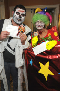 Halloween staff honors went to the ghoulish Khaled Amir and the grinning “Jack-in-box” Noreen Long.