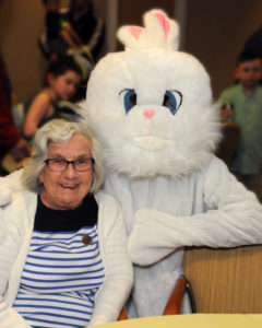 The Easter Bunny and resident Anne Laskey appear to be the best of pals.