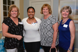 John Scott Rehab and Nursing Center staff networked with colleagues at the Village at Proprietors Green Lobsterbake. They included from left t right: Marie Neff, director of admissions; Nicole Abbott, social worker; and Michelle Clark, director of social work.