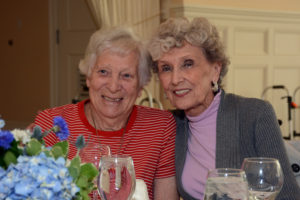 New Village at Proprietors Green residents Mary Hoban and Shirley Rogers enjoy capturing the moment at the Welch Senior Living Assisted Living Week Luncheon.