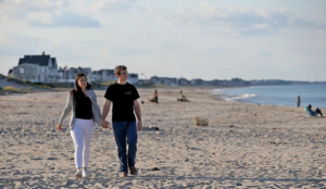 Valeria Musiienko of Kyiv, Ukraine enjoys the ocean and Rexhame Beach with her partner, Derek Morrison, which she has been able to now that she has escaped the war in Ukraine and is living in Marshfield on Wednesday, Sept. 14, 2022. Robin Chan/ Wicked Local Staff Photo